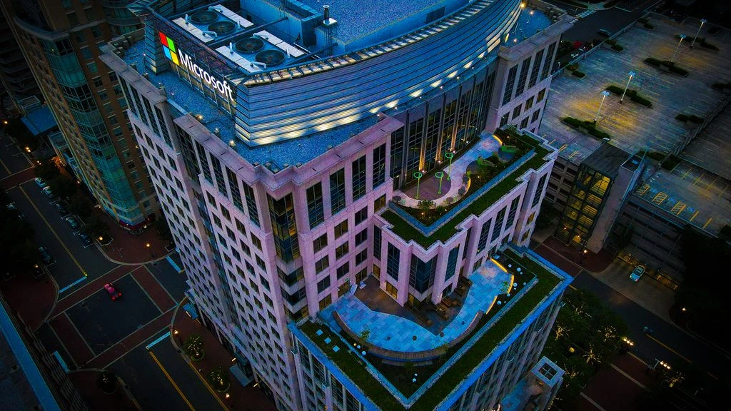 Aerial plate of a glass commercial development photographed at golden hour