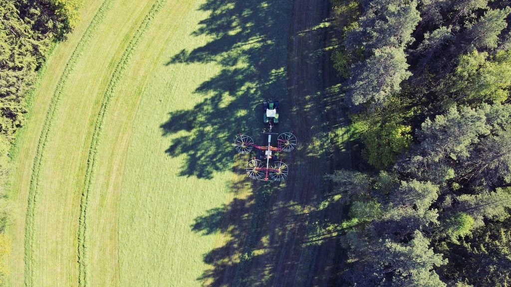 Freefly Alta X with cinema payload over a forested ridge