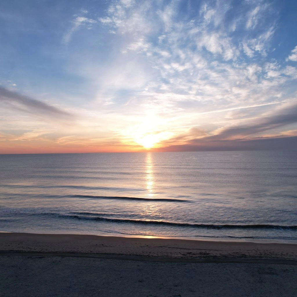 Marriott resort coastal aerial at sunrise